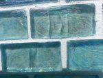 cracking NPT Arctic glass pool tile.jpg