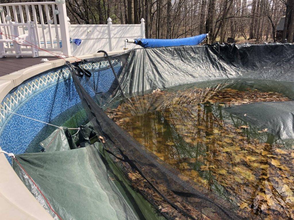 A leaf net installed over a pool cover can help with your pool opening this year.