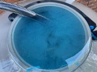 Greenish-blue water with sediment when deep cleaning sand filter.