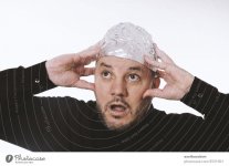 3531901-paranoid-man-wearing-tin-foil-hat-conspiracy-theory-photocase-stock-photo-large.jpeg