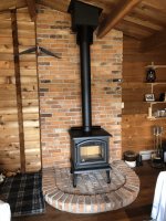 wood-stove-on-brick.jpg