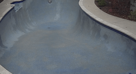 Drained pool showing discoloration.png