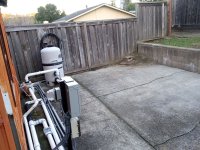 Rear Fence Pool Equipment - Heater to go where brick and dirt sit.jpg