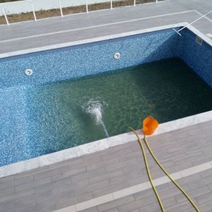 Partly filled pool (55 cm) with iron