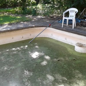 Water level at pool pad floor shallow end jets.jpg