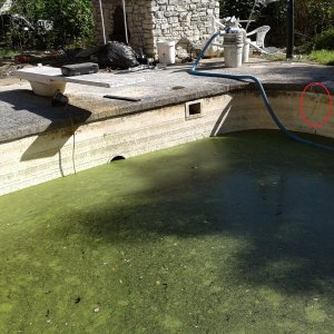 Water level at pool pad floor deep end - crack.jpg