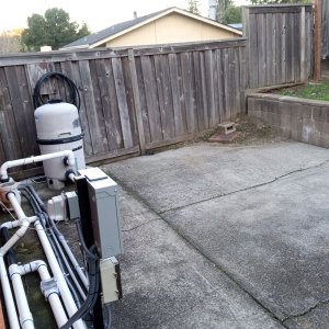 Rear Fence Pool Equipment - Heater to go where brick and dirt sit.jpg