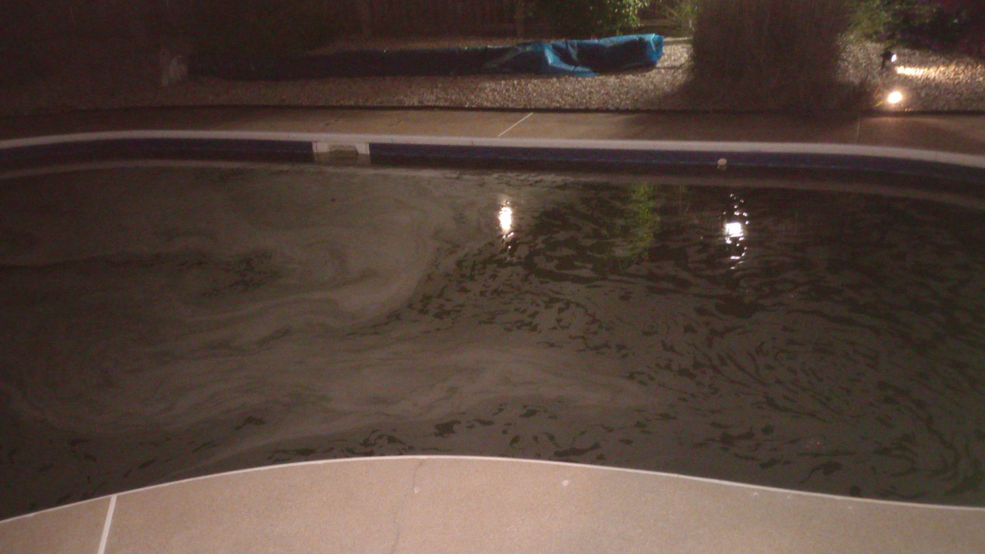 FORT_WAYNE_POOL_GREENISH_WATER_PUMP_RUNNING_SUPERCHLORINATED_SURFACE_WATER.jpg