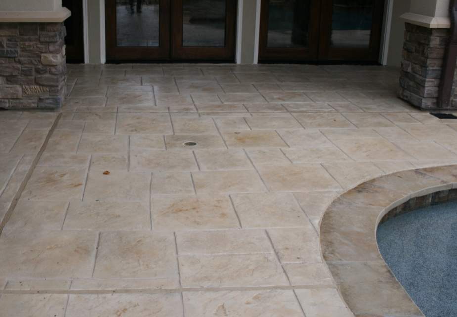 large-ashlar-slate-pool-decks-stamped-colored-concrete-patios-custom-leisure-pools-pool-builder-.jpg