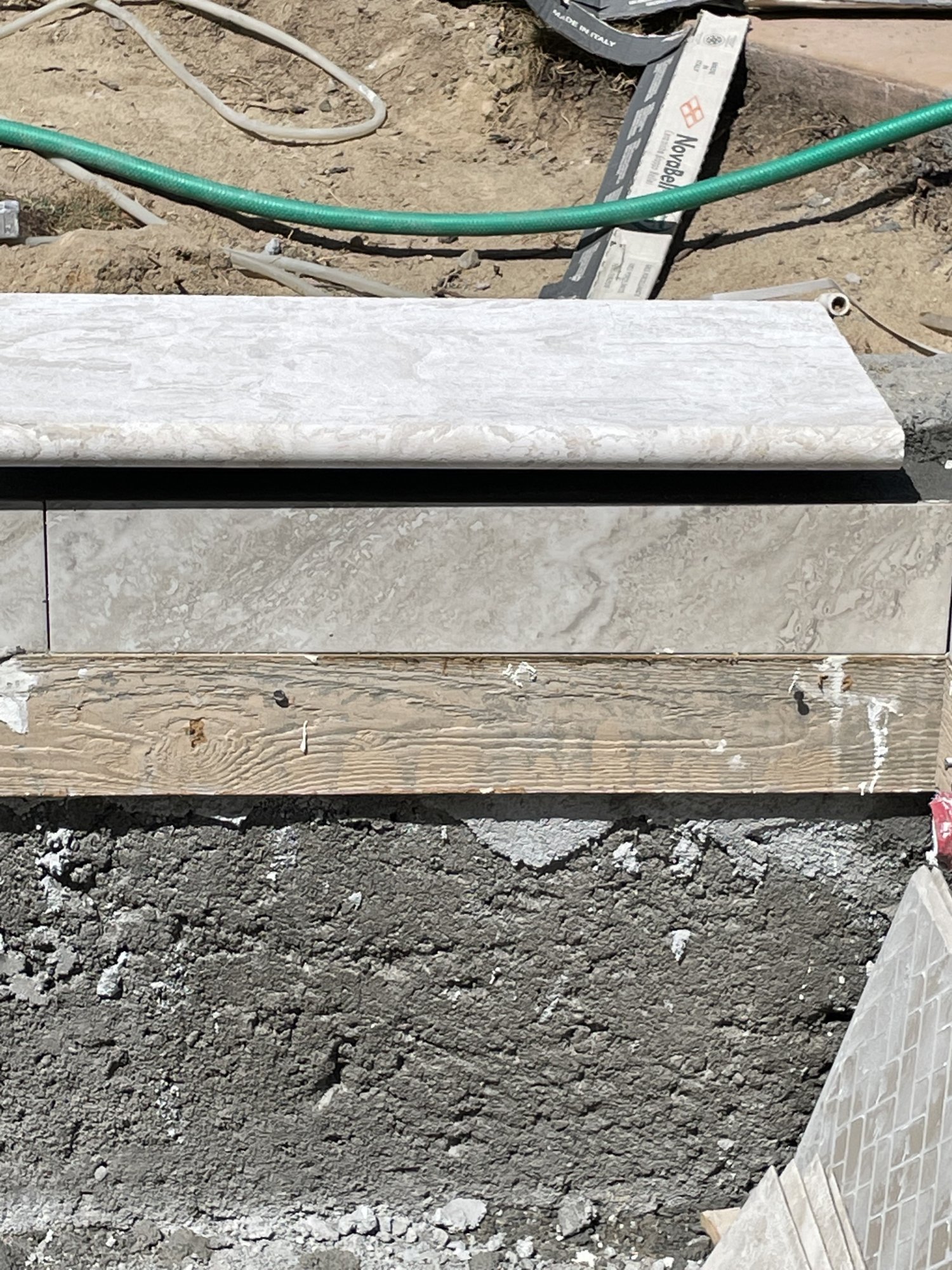 Marble coping preview next to watertile.jpg