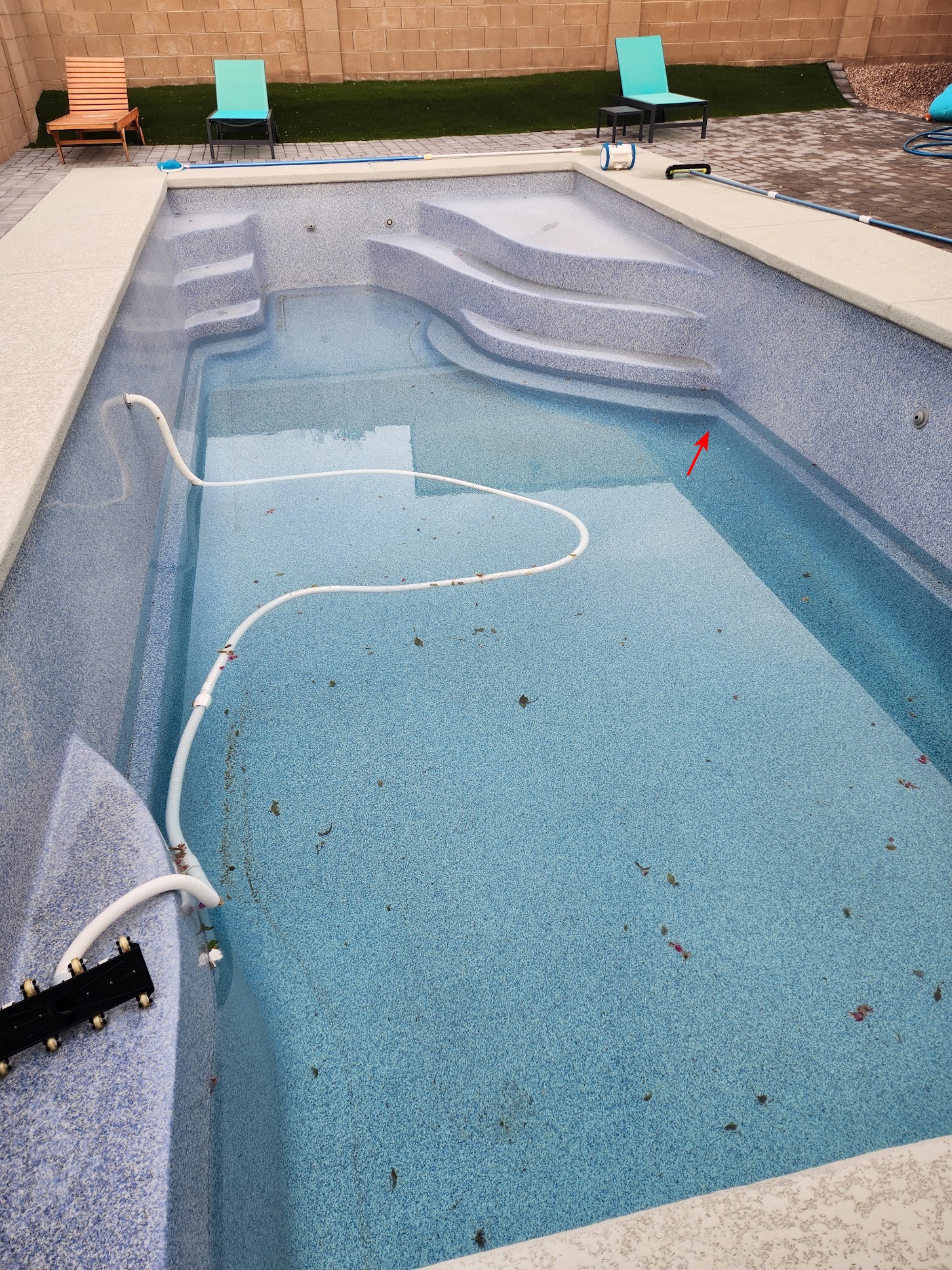 Pool crack wide view w pool almost empty.jpg