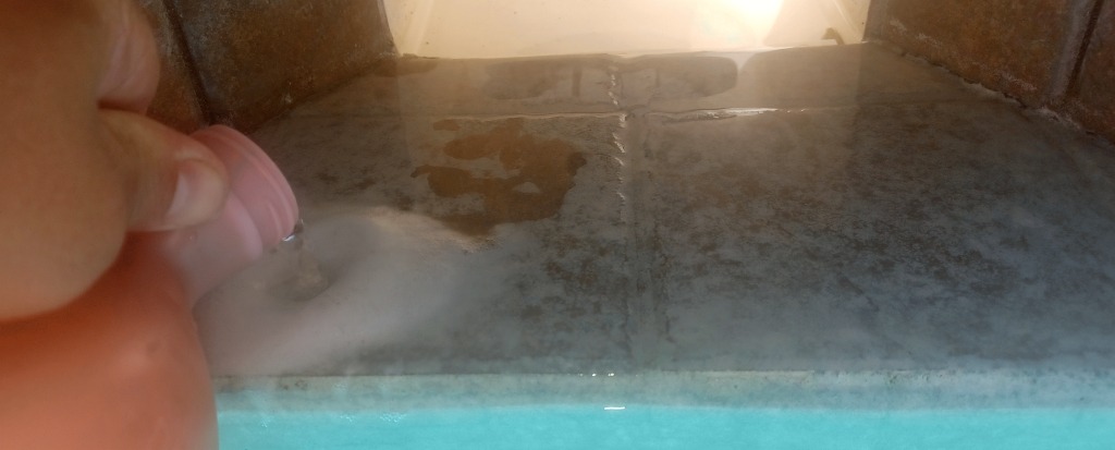pour_acid_directly_on_skimmer_flat_tiles_to_dissolve_scale.jpg