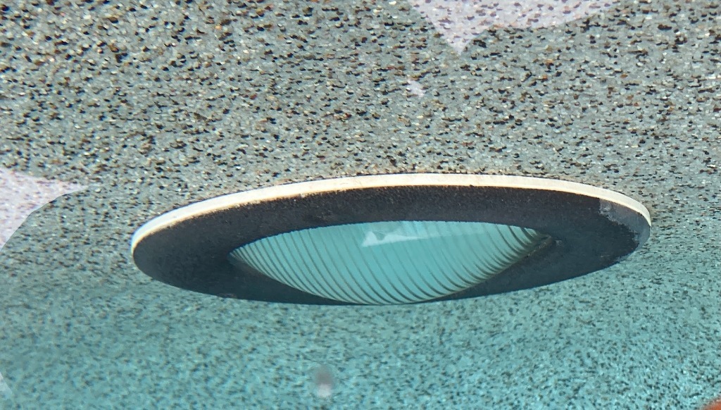 rusted pool light.jpg