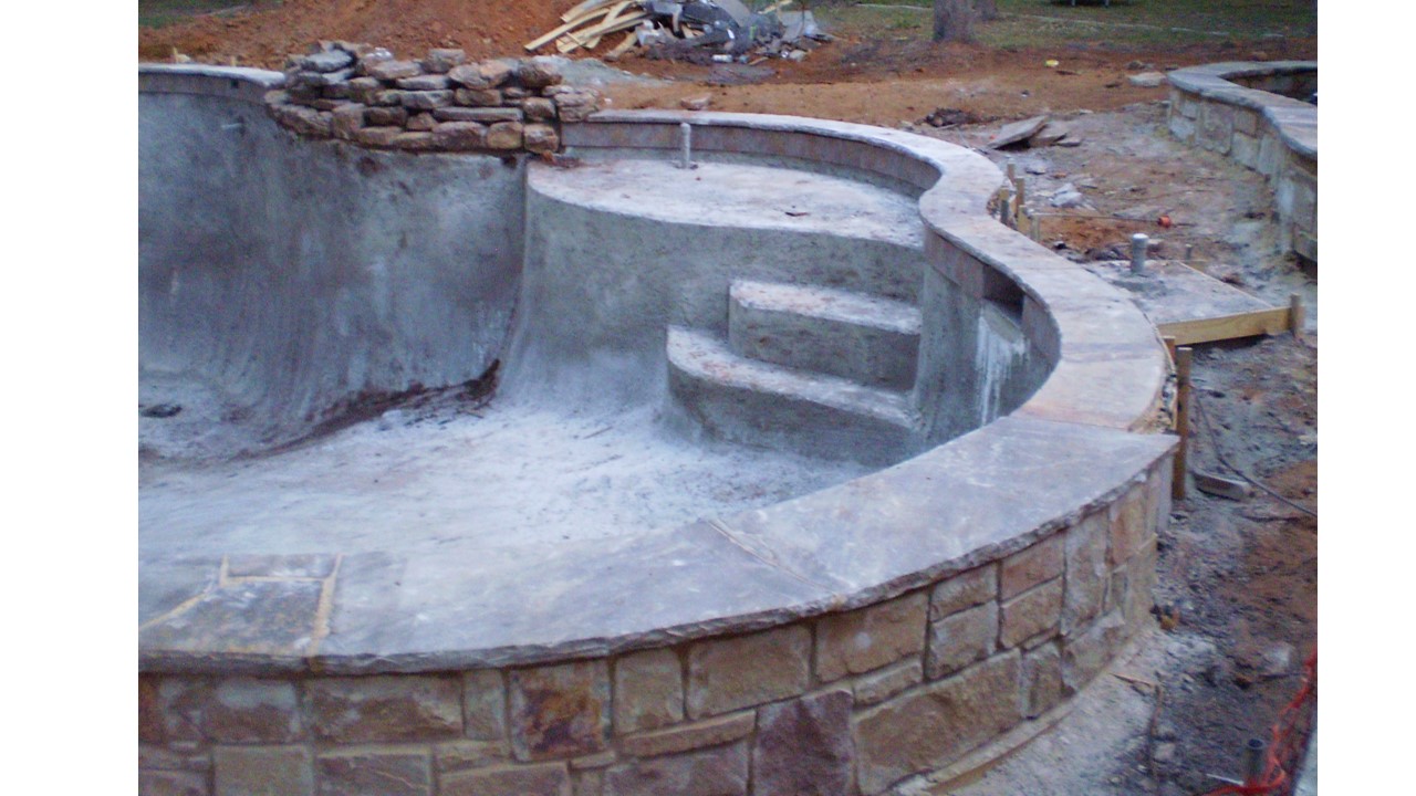 sandstone wall with Oklahoma flagstone for cap and showing tile.jpg